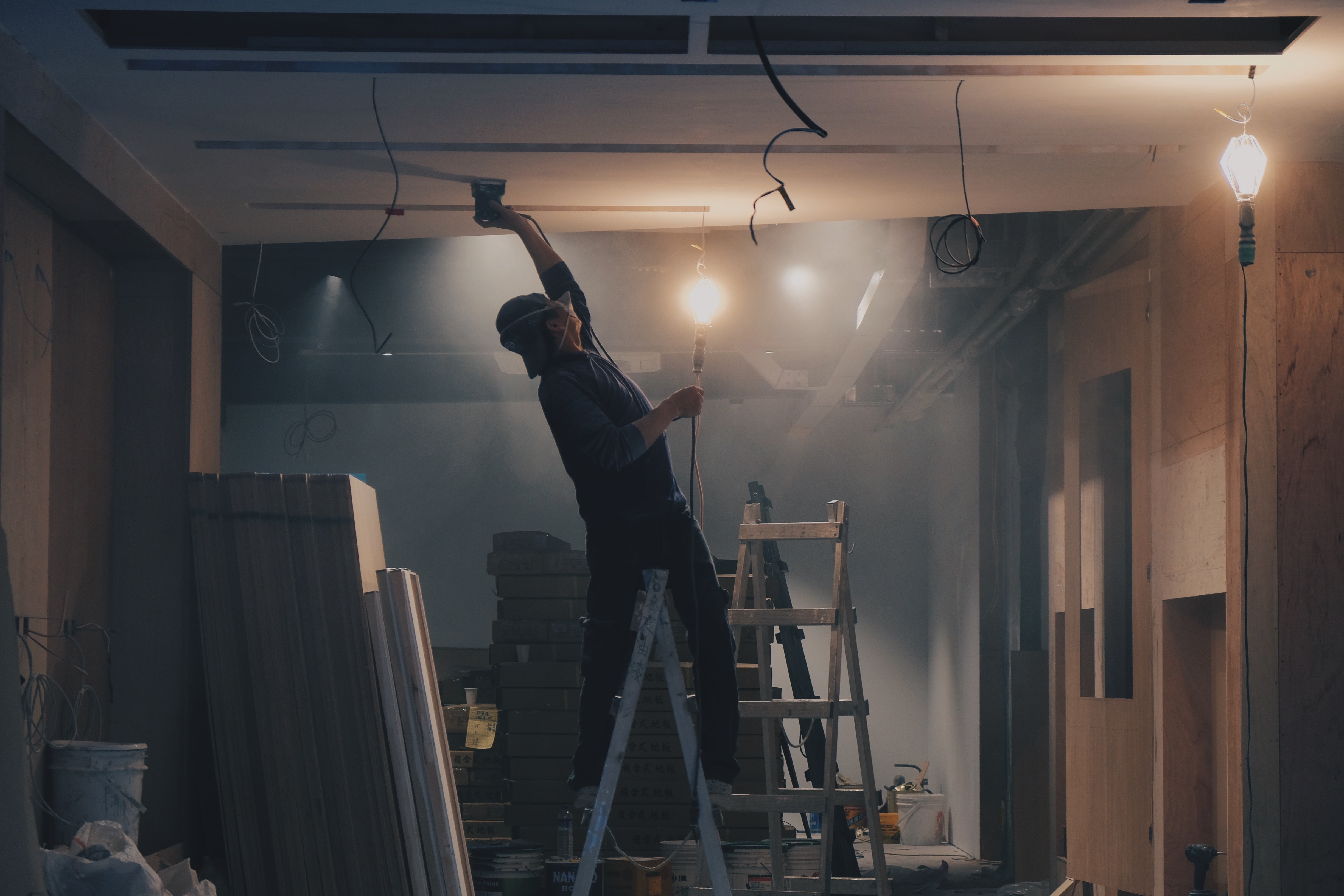 Worker doing roof treatment